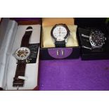 Three gent's fashion wrist watches by Shanghai Tang, Ultimate Chrono & PWC London