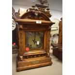 A 19th Century German carved mantel clock