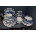 An assortment of blue and white ware including Wedgwood and Johnson Bros.