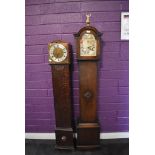 An Enfield Granddaughter clock and an oak bodied granddaughter clock with a quartz movement