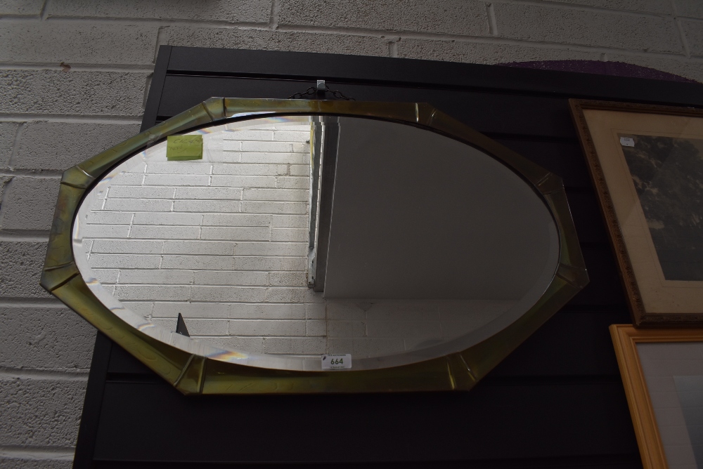 An art deco design mirror having geometric metal frame work