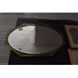 An art deco design mirror having geometric metal frame work