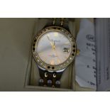 A gent's Ingersoll Gems IG0016FL wrist watch having stone set bezel with gold plated and steel