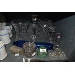 A selection of glass wares including cut candle sticks water jug and vase etc