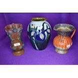 Three pieces of arts and crafts style pottery including newt or lizard decorated and similar Adams
