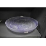 A smoked art glass bowl having white and purple hues