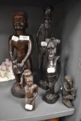 A selection of hand carved African ethnic tribal figures of various designs