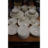 A selection of tea and dinner wares by Coalport in the Countryware design including tea cups and