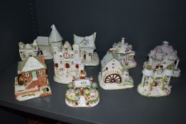 Ten ceramic model figure studies of cottages and buildings by Coalport all in fine condition