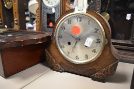A mid century 8 day mantel clock