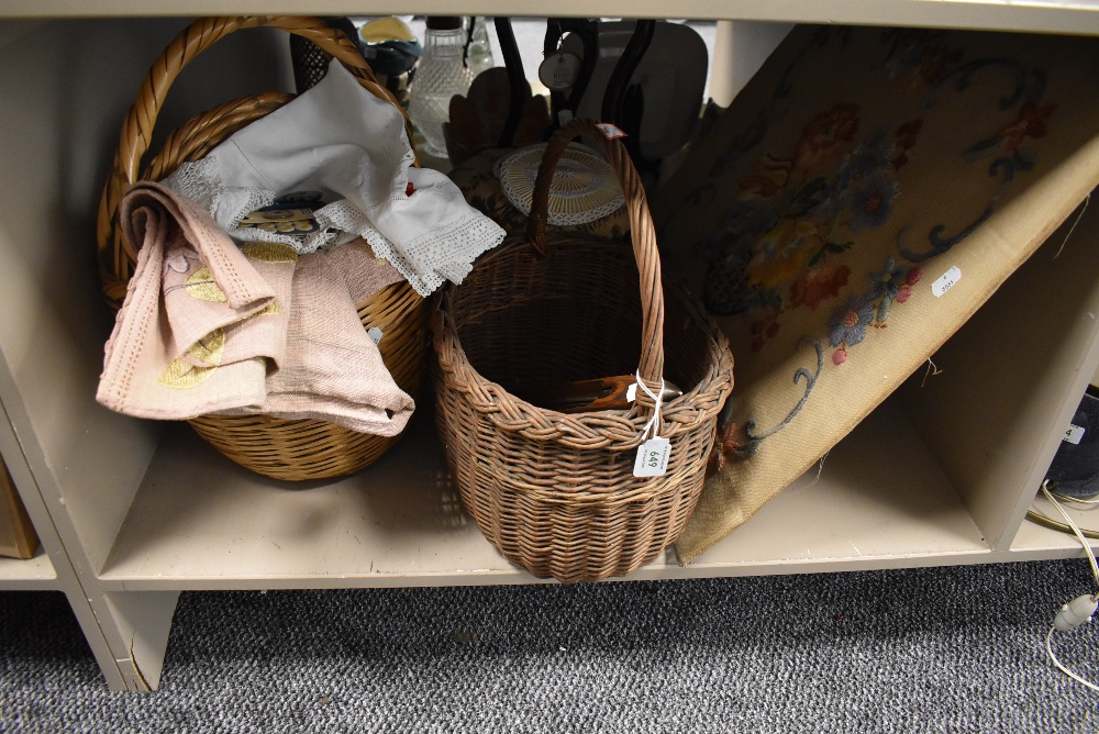 A selection of haberdashery items including loom shuttle and crewel work panel