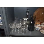 A selection of glass, including cut glass, decanters and a jug.