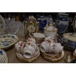 A part tea service by Elizabethan in the Queens Rose design and similar mantle clock