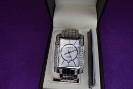 A gent's Diamond & Co wrist watch no: DC030 having a baton numeral dial to decorative rectangular
