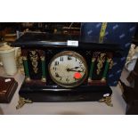 An American 8 day Marble effect mantel clock