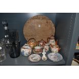 A selection of Chinese styled ceramics and porcelain including wooden bread board with dragon