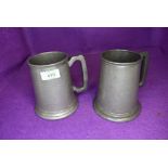 Two pewter beer mugs or tankard one glass bottom and one by Craftsman