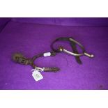 Two horse riding spurs one traditional design and similar middle eastern or Islamic style