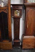 An A J Thompson of Leeds grandmother clock