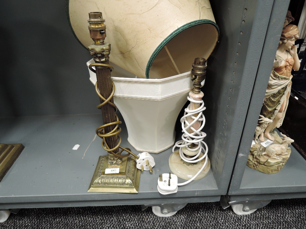 A brass cast table lamp having a Greek column stem and a similar agate turned lamp base