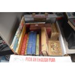 A selection of text and reading books including Beatrix Potter and Laurie Lee