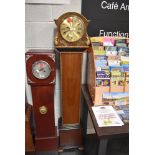 A Granddaughter clock with quartz movement in a 1930's case