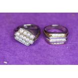 Two gent's white metal rings stamped 925 having diamante decoration, both size U