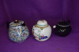 A Chinese ginger jar and two small sized tea pots