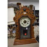 An Ansonia Clock Co, America 8 day gingerbreaad clock