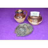 Two miniature ceramics by Royal Doulton Lambeth a squat vase and a HM silver rim small jug