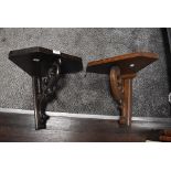 two oak wall sconce or shelf bracket having naturalistic carved support one oak and one dark