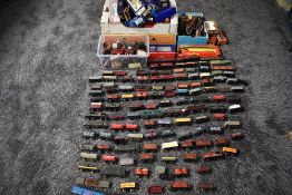 A large collection of Bachmann, Hornby, Mainline and similar 00 gauge rolling stock, with empty