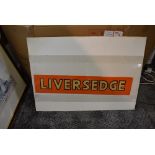 A Railway Station unused Name Strip for Liversedge having yellow lettering with black letter