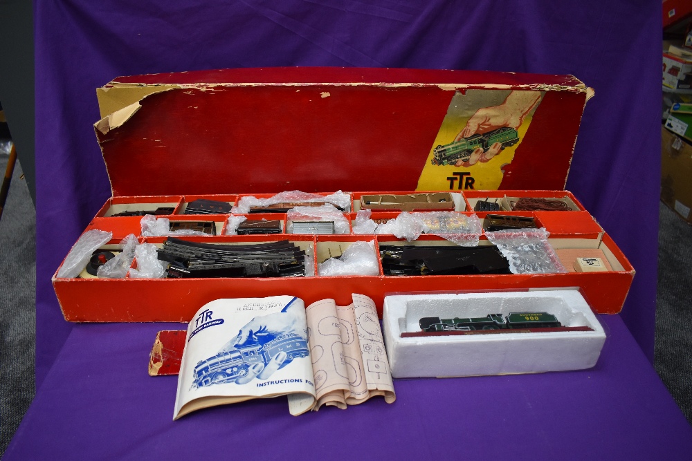 A TTR Trix Twin Railway Goods Train Set No 2/324 comprising, LMS 0-4-0 Loco & Tender, seven