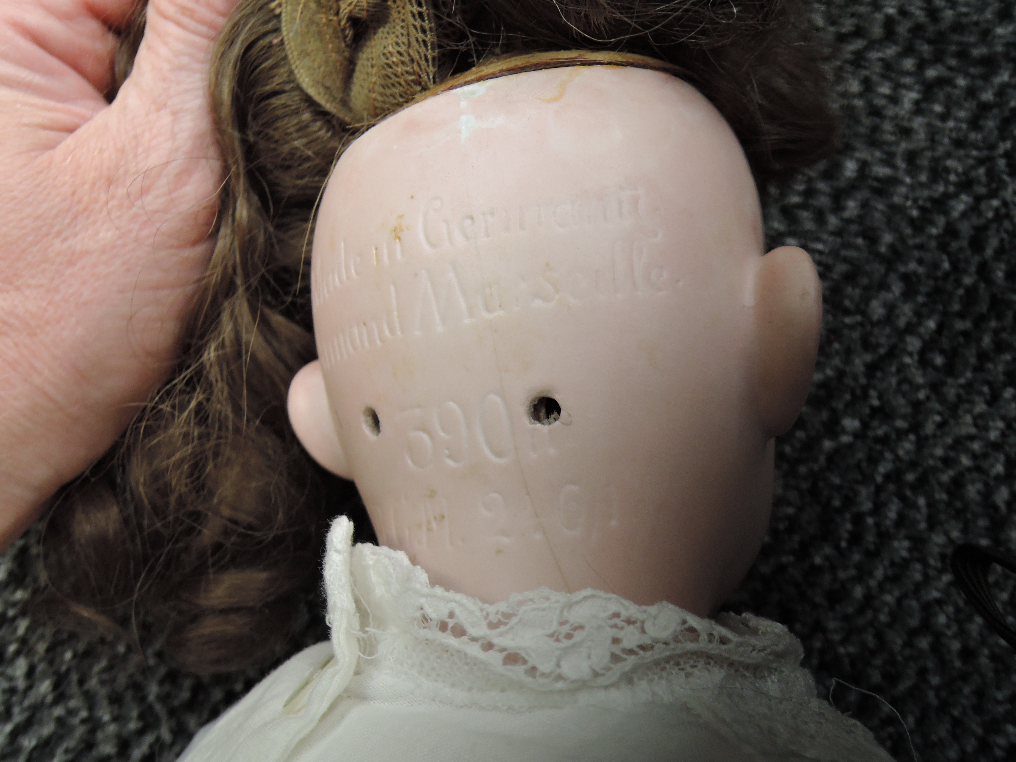An early 20th century German Armand Marseille Bisque Socket Headed Doll having sleep blue eyes, open - Image 4 of 6