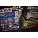 A shelf of vintage Games including Game of Life, Downfall, Ker Plunk, Bread, Stay Alive, Bed Bugs,