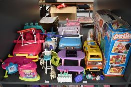 A large collection over four shelves of Sindy, My Little Pony, Barbie Dolls and many accessories,