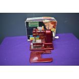 A 1960's Vulcan Senior Child's Sewing Machine in original box