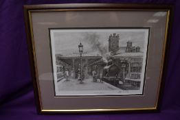 A framed print after J S Gibb, Ulverston Station, bearing signature, 35cm x 42cm including frame