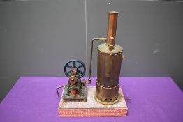 A well engineered Single Cylinder vertical live steam model Mill Engine having spoked flywheel,