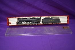 A Rivarossi HO scale 2-8-4 NYC & STL Nickel Plate Road Loco & Tender 779, in original display box