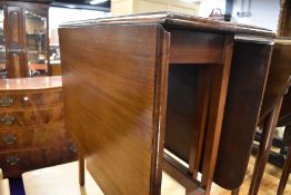 An early to mid 20th Century mahogany gate leg table