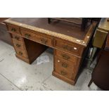 A Victorian Aesthetic style oak pedestal desk, dimensions approx. W122 D68 H76cm