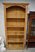 A natural pine bookshelf approx. W91cm H197cm