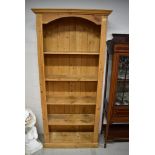 A natural pine bookshelf approx. W91cm H197cm