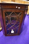 A 19th Century mahogany corner display cabinet inlaid detailing to door, approx width 77cm