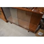 A vintage teak bookcase, labelled Avalon