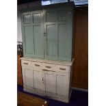 A late 19th or early 20th Century pantry or utility cupboard with dresser base in painted pine 140cm