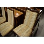 A vintage G plan gateleg dining table and four similar upholstered dining chairs