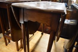 An early 20th Century mahogany gateleg table on cabriole legs